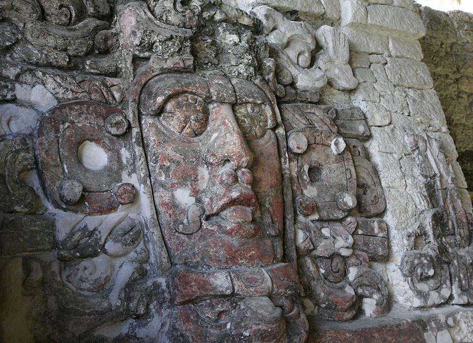 Stone Masks at the Temple of the Masks in Kohunlich Mexico