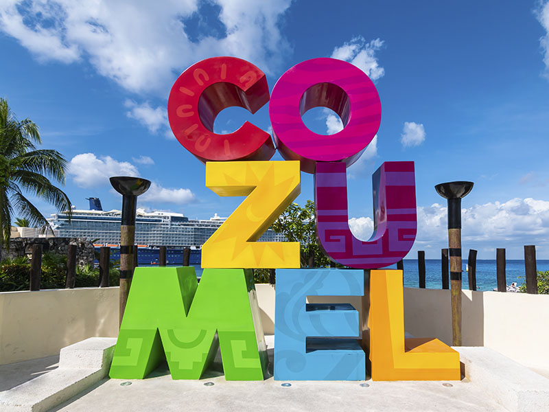Cozumel Sign with Ship in Background