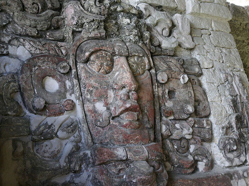 Stone Masks at the Temple of the Masks in Kohunlich Mexico
